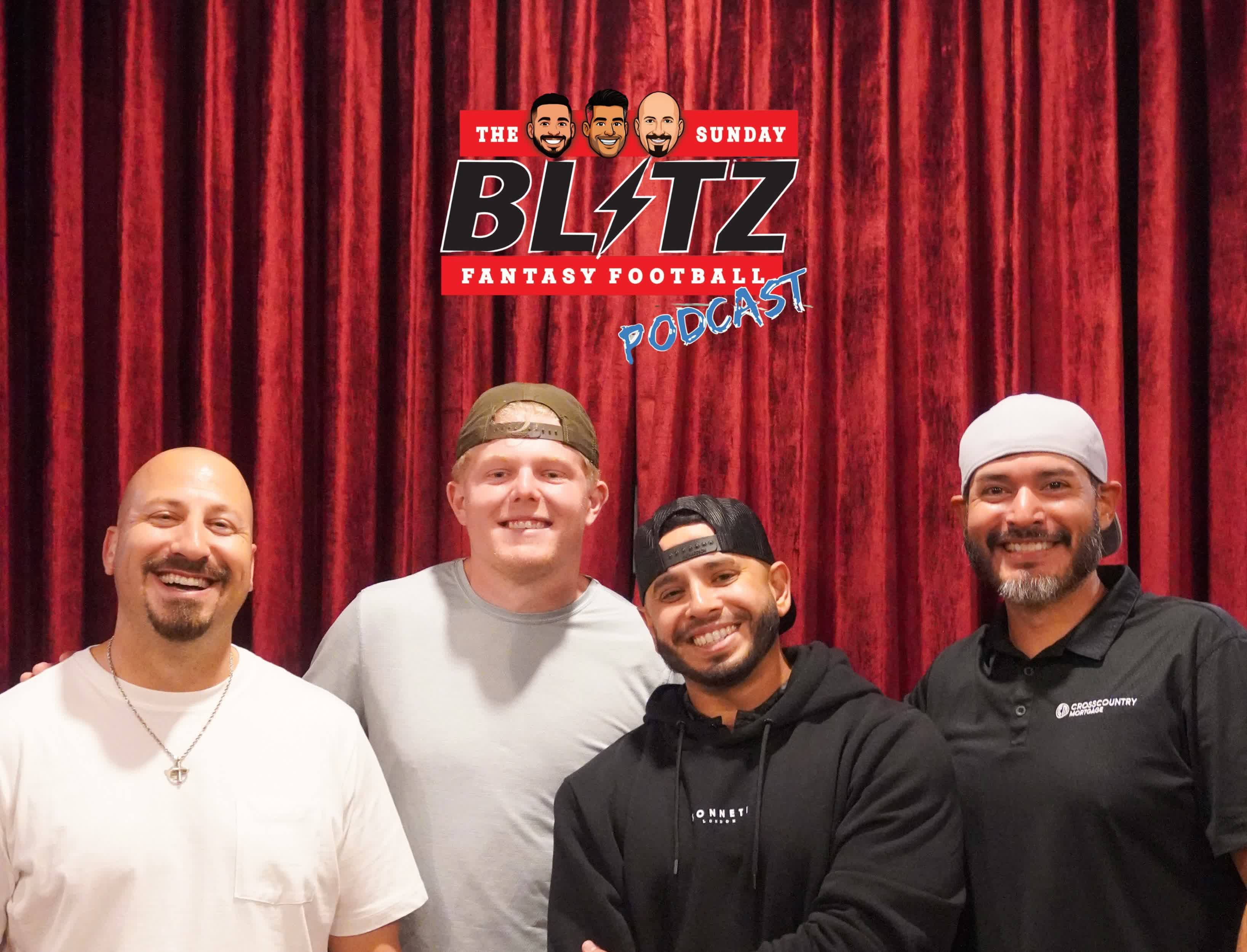 The four Sunday Blitz hosts against the show’s red curtain