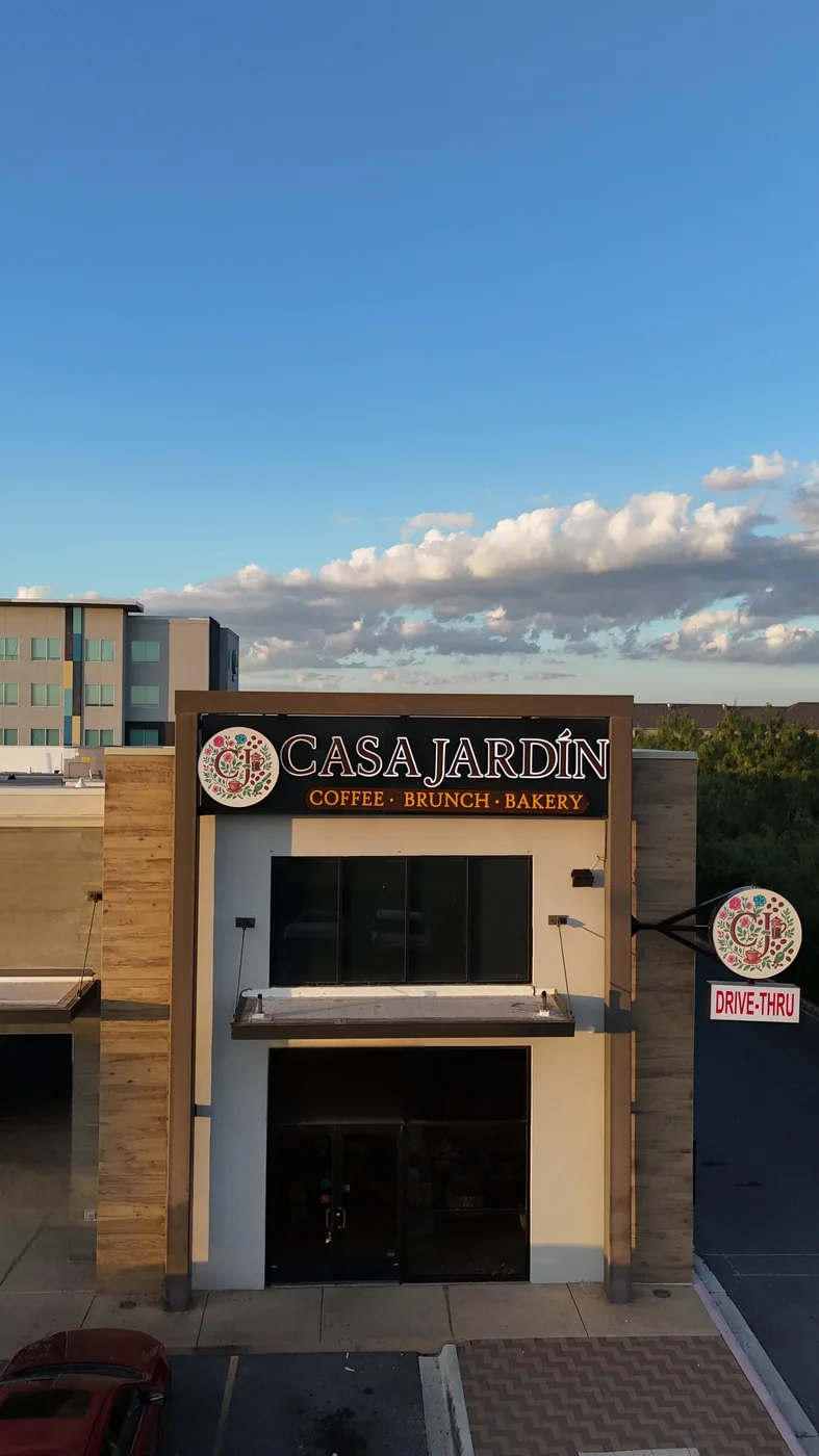 Casa Jardín storefront under a bright blue daytime sky