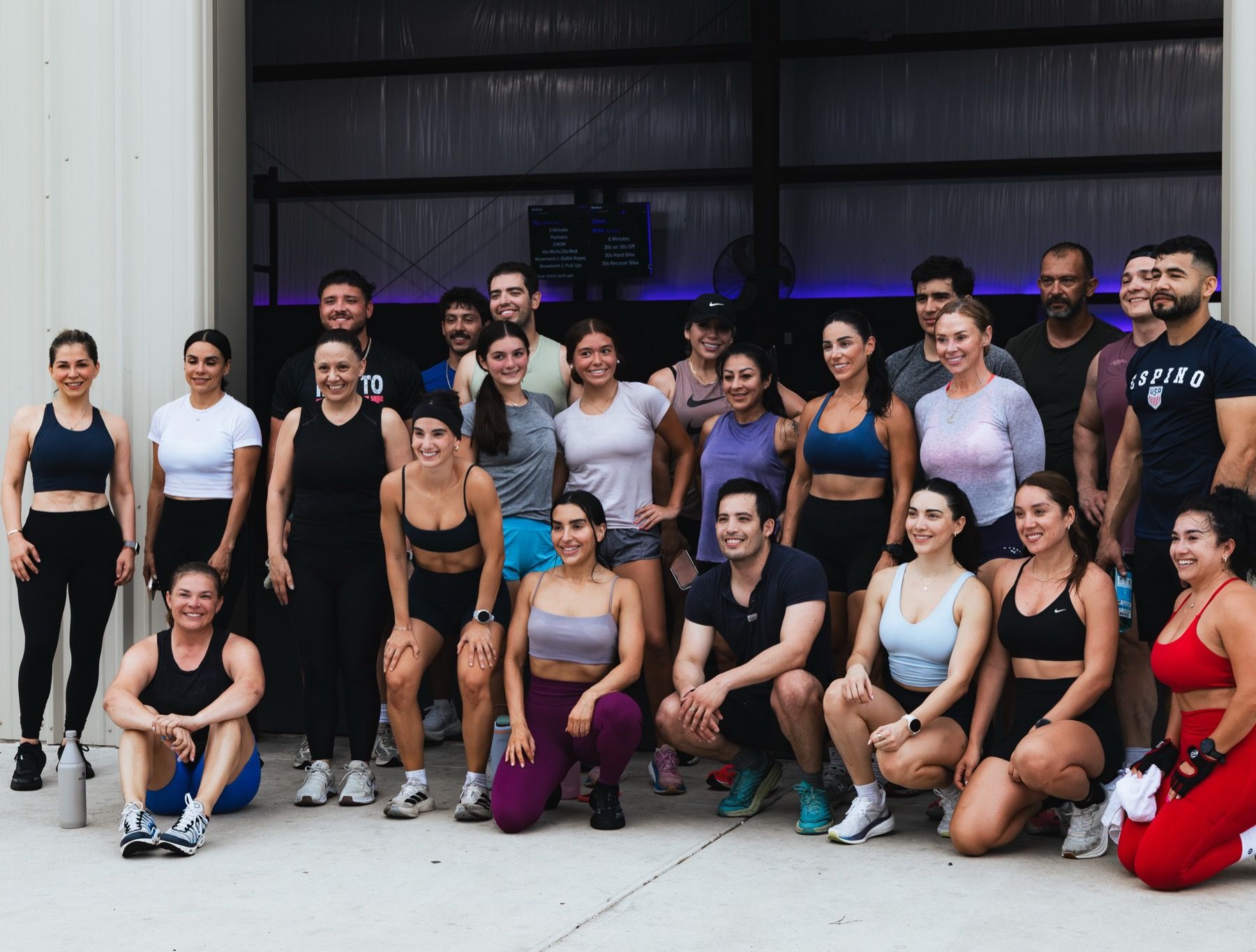 The MOB Fitness community in an original brand photograph