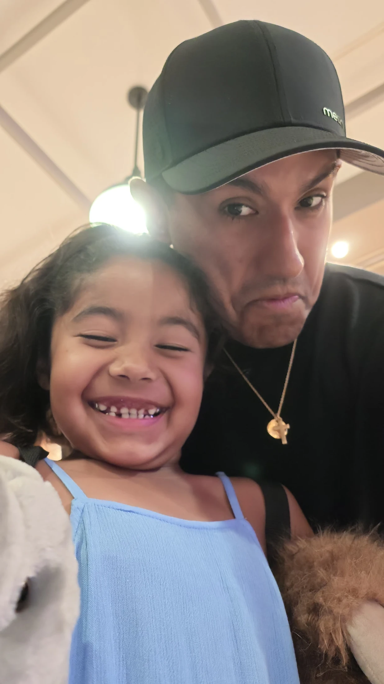 Penny smiling with her dad Neil